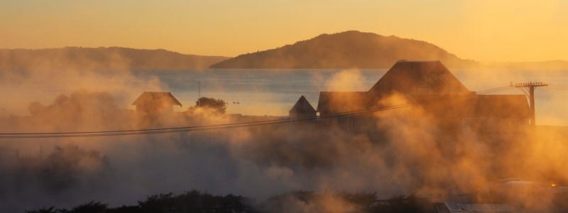 View across Rotorua Lake with geothermal activity